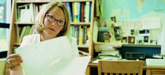 Woman reading papers