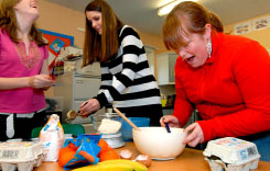 three women cooking