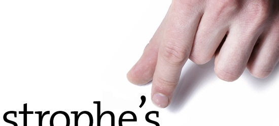 Fingers picking up an apostrophe