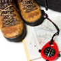 Walking boots, map and compass